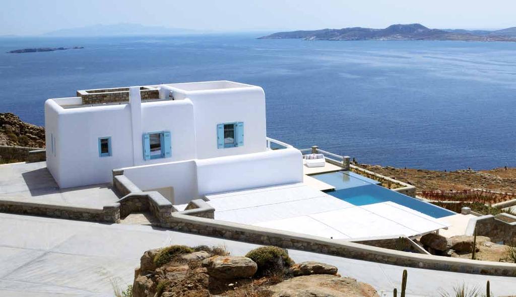 A cluster of heritage boulders on the north side of the property encloses the outdoor entertainment areas beneath vernacular wood and reed pergolas, simultaneously protecting the