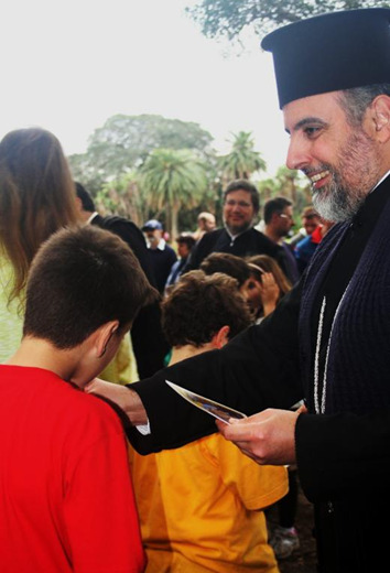 The children participating in organized games at the picnic.