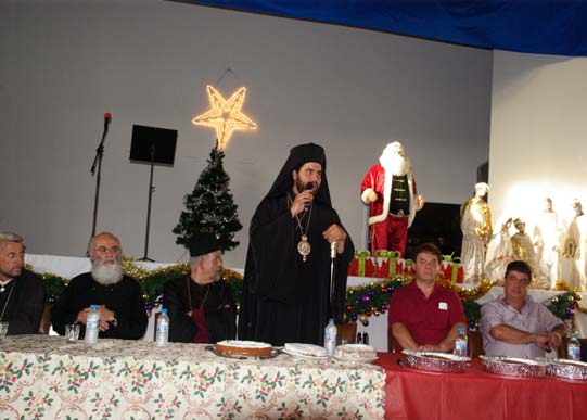 held its annual cu ng of the New Year s Day tradi onal cake on Friday 2 January 2015 at Olympic Hall. The President of the Community Mr.