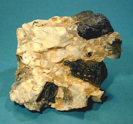 Granite - intrusive Pegmatite a Special Case feldspar tourmaline PEGMATITES are classified as intrusive igneous rocks, but there is a difference.