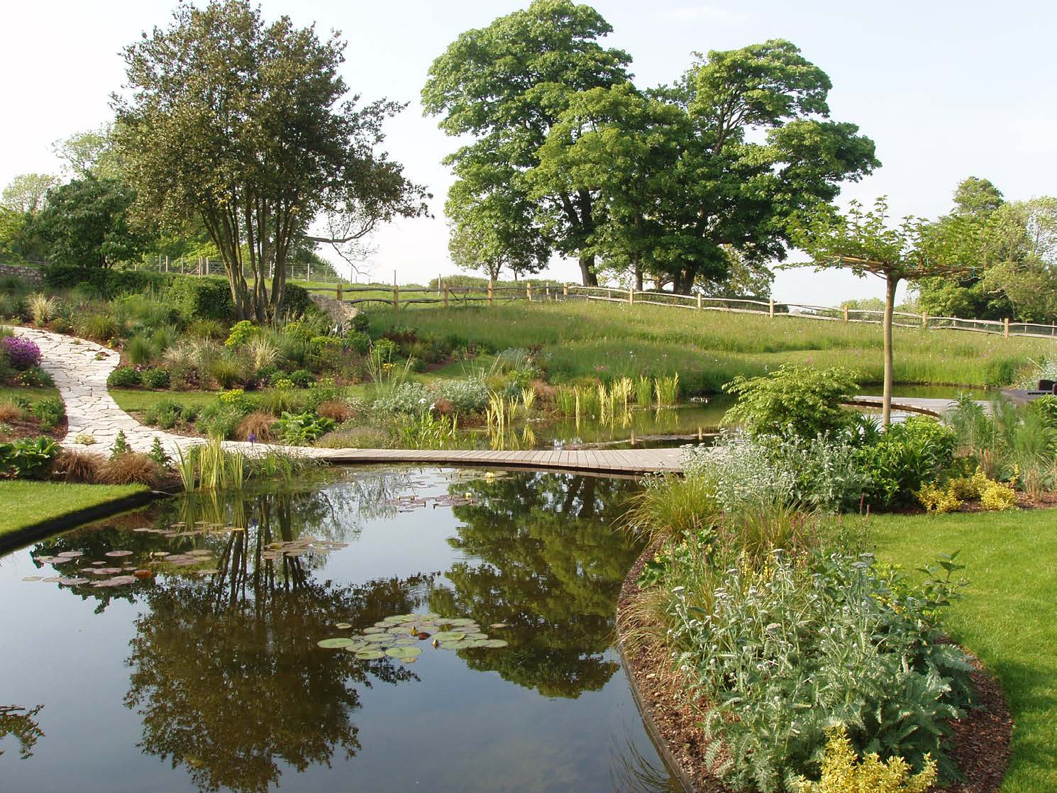 This garden has many different areas; a pond, meadow and lawn - but they are