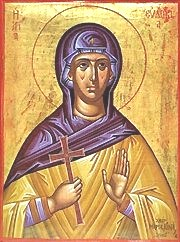 Afterwards she laboured in the spread of the Gospel in various places, and finally received the crown of martyrdom in Rome with her two sons and five sisters, during the persecutions under the