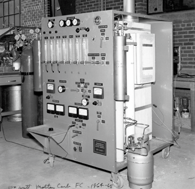 At the anode, hydrogen reacts with the ions to produce water, carbon dioxide, and electrons.