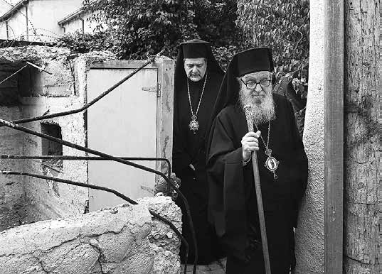 VISITS OVERSEAS Ecumenical Patriarch Bartholomew blesses Pope Francis during the Divine