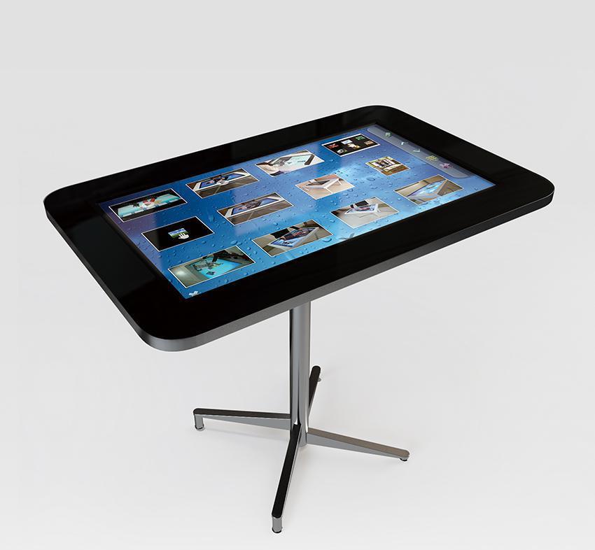 Multi-touch table Τραπέζι πολλαπλής αφής Το τραπέζι πολλαπλής αφής είναι μια πολυμεσική λύση που συνδυάζει software και hardware μαζί.