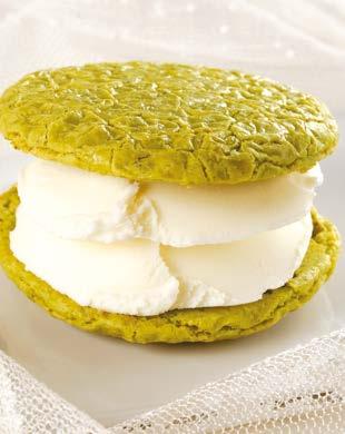 special Almond Cookie; two layers of plain ice cream served with powder pistachio Μπισκότο Αμυγδαλόπαστας με γέμιση Παγωτό Honey & Pistachio Almond Cookie Sandwich Mado Fıstıklısı Arası Dondurma