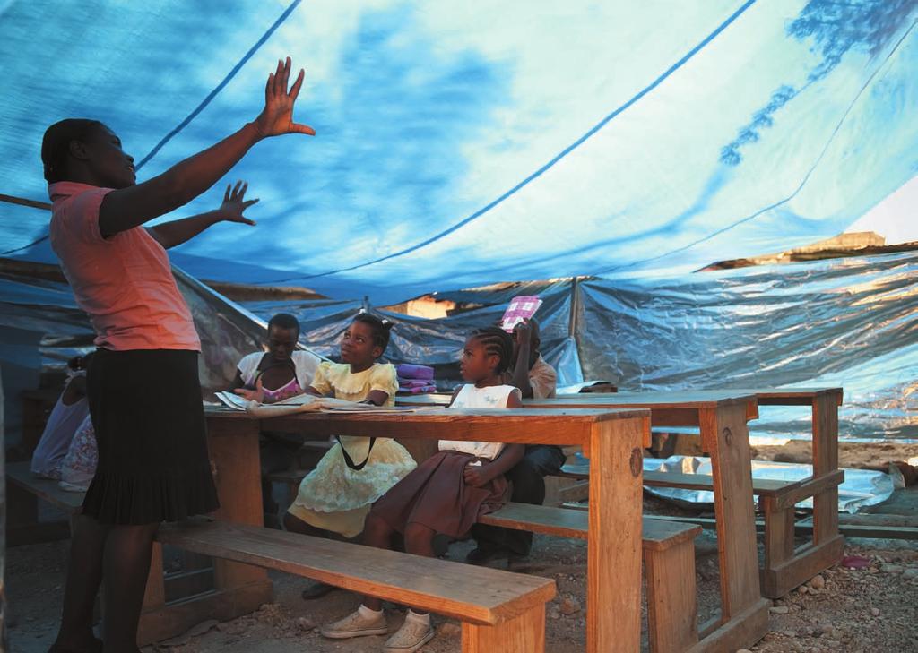 κάρτα 5 H GUERRIETTE ΑΠO ΤΗΝ ΑΪΤH «Το σχολείο Philippeaux άνοιξε, χάρη στη βοήθεια της ActionAid και του τοπικού της εταίρου Cozpam στις 5 Απριλίου 2010, 3 μήνες μετά τον καταστρεπτικό σεισμό.