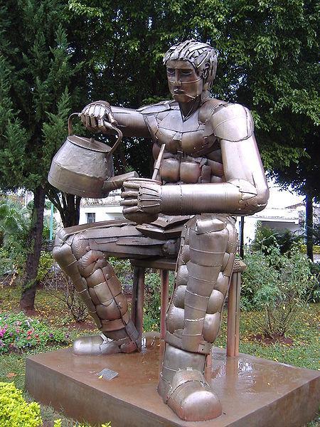 Statue of a man preparing