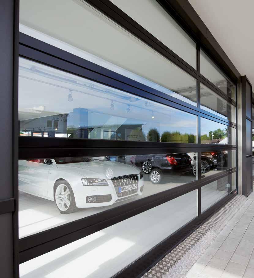 ALR F42 Glazing, ALR 67 Thermo Glazing Alumīnija vārti ar lielizmēra stiklojumiem Autosaloni Pateicoties