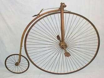 1879: Το πρώτο ποδήλατο προωθούμενο από τα πόδια με αλυσίδα στον πίσω τροχό. 1880: Dicycle.