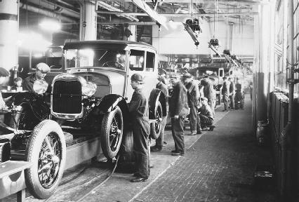 Η αρχή. 1900 1910. Μέση βιοτεχνική πόλη του Αμερικανικού Βορρά. O Henry Ford εφαρμόζει την γραμμή παραγωγής. Επανάσταση στη Βιομηχανική παραγωγή.