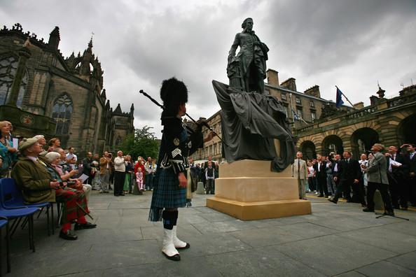 Adam Smith (1723-1790) A crowd gather to watch the unveiling of a 10ft bronze statue of Scottish economist, philosopher and author Adam Smith (1723-1790) at the