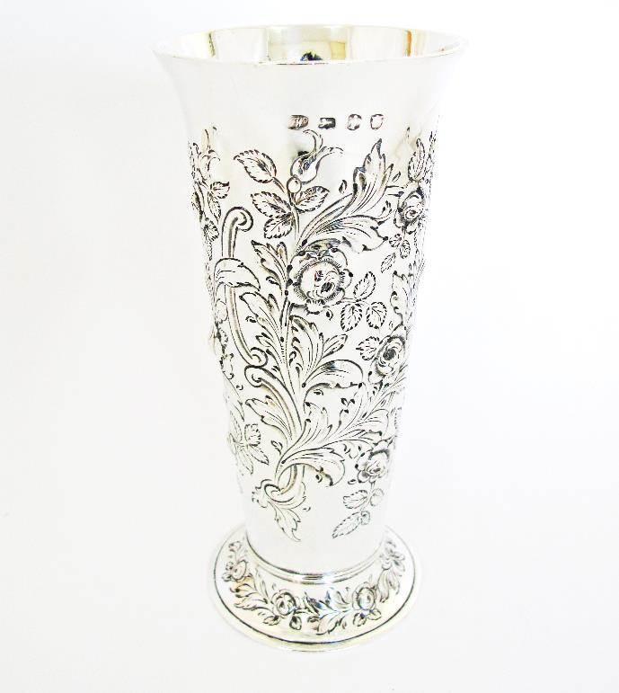 A Sterling silver ashtray on four ball feet