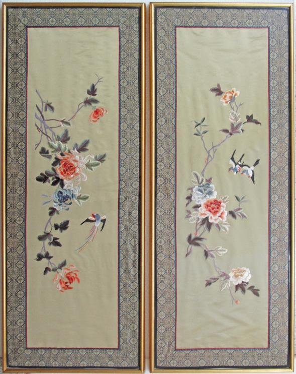 A fine Chinese silk embroidery in blue colours of flowers and waves.