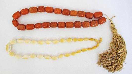 A 19th century graduated ivory bead necklace, the largest bead 35mm, length 70cm