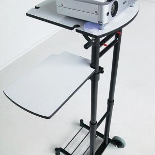 Untere Fläche drehbar, für Laptop. Mittels Gasfeder stufenlos höhenverstellbar. Kann zusammengeklappt als Rollgestell gebraucht werden.