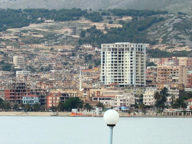 Photo of Saranda, nowadays, where it can be seen a very high building in the middle of the town which undoubtedly it s not at all in harmony with the other buildings around it.