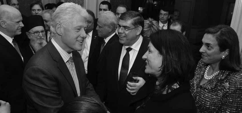 FAITH: AN ENDOWMENT FOR ORTHODOXY & HELLENISM 1 (1) Former U.S. President Bill Clinton greets Faith Endowment members Maria Allwin and Kathy Sakellaris.