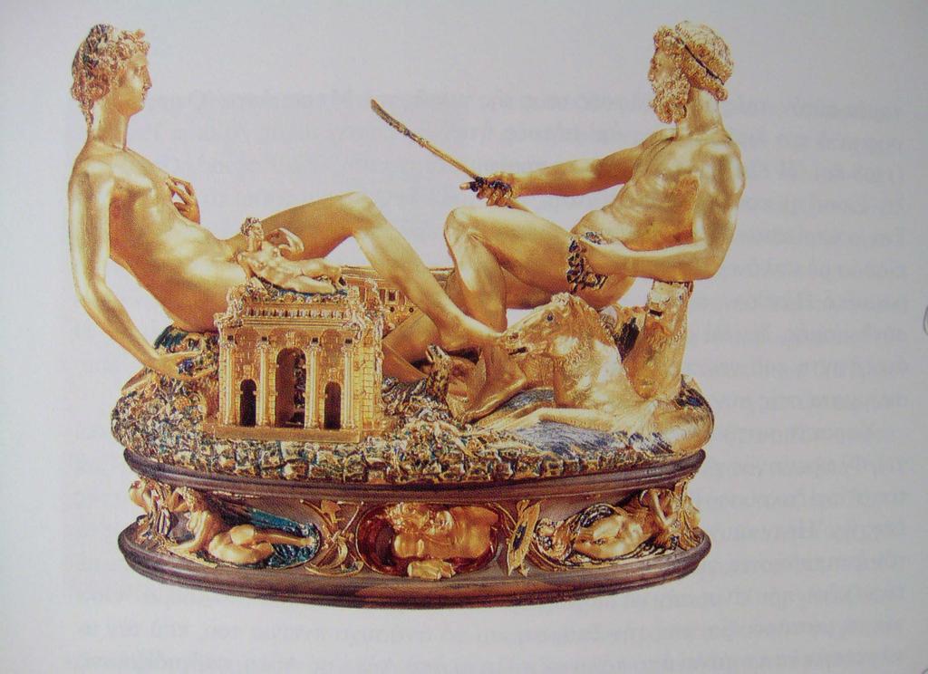 Τίτλος: Αλατιέρα Καλλιτέχνης: Μπενβενούτο Τσελλίνι Χρονολογία: 1543 Υλικό: Σκαλισµένος χρυσός και σµάλτο σε εβένινη βάση Περιγραφή: Χρυσή αλατιέρα που ο καλλιτέχνης έφτιαξε για τον βασιλιά της