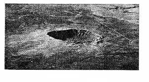 18-g bullet moving at 672 m/s strikes a 715-g wood~n block at rest on a frictionless surface. The bullet emerges with its speed reduced to 428 m/s. Find the resulting speed of the block.