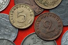 Τα γερμανικά κέρματα ευρώ απεικονίζουν τρία διαφορετικά σχέδια σε καθεμιά από τις