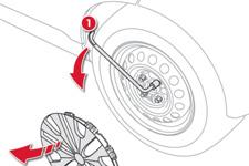 Πρακτικές πληροφορίες Αφαίρεση του τροχού Τοποθέτηση της ρεζέρβας 1. Αφαιρέστε το τάσι. 2. Λασκάρετε τα μπουλόνια του τροχού με το μπουλονόκλειδο 1. 1. Τοποθετήστε τη ρεζέρβα.