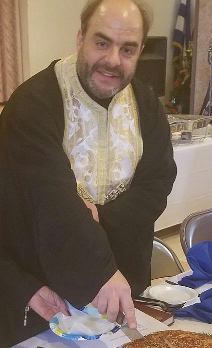 twice in December Father George cuts the