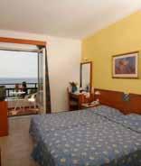 Hotel Glicorisa Beach 3* Το Glicorisa Beach Hotel διαθέτει φωτεινά και κλιματιζόμενα