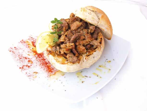 50 Mezedes Tigania stir fried pork Tigania stir fried chicken with honey and mustard Mixed Tigania in grilled bread Bekri meze pork tender loins finished with red wine, red sauce and vegetables