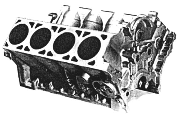 227 Fig. 331 Prerja e bllokut te derdhur me pjesën e epërme te shtëpizës se motorit. Ne fig. 332 dhe fig.