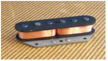 Γ. Διπλοί σε Μέγεθος Μονών (Stack Humbuckers). Αυτοί οι μαγνήτες φτιάχτηκαν στα μέσα της δεκαετίας του 70, για να δώσουν λύση στις κιθάρες με μονούς μαγνήτες που είχαν θορύβους.