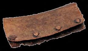 214. Оков Бронза, ковање, перфорирање; димензије: 4,3 х 1,9 х 0,4 cm; Сонда 2/14 (испод Објекта IV), Горњи град,