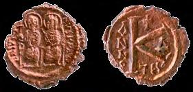 Солид Јустина II Злато; ковање; R = 2,0-2,1 cm; случајан налаз код спољашње стране северозападног угла гробнице на свод, код Базилике B, ареал некрополе; Народни музеј Чачак, Н 52. 567-578. година.