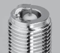 The smaller diameter centre electrode means the voltage required to produce a spark is reduced.