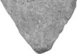 38. Фрагмент споменика од беличастог кречњака, димензија 3,9 x 7,3 x 3,0 cm.