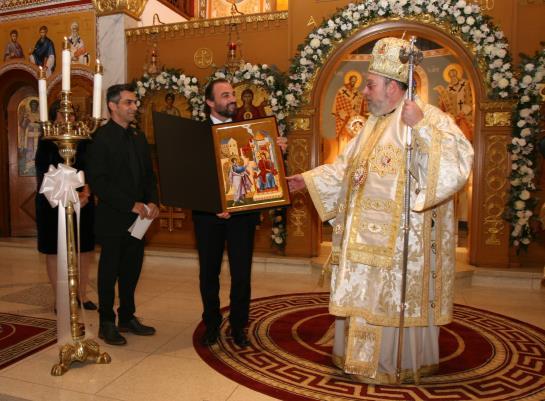 receiving an icon from iconographers