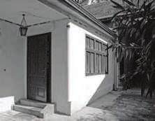 carriage with the door leading to the right side of the house