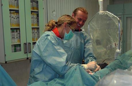 Asoc. prof. Andrejs Ērglis un Dr. Inga Narbute cilmes šūnu transplantācijas laikā 2008. gada 18. septembrī Asoc. prof. Andrejs Ērglis, spēlējot tenisu, 2009.
