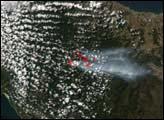 Fires in Tasmania Пожари иницирани громом у фебруару 2007. г. наставили су да горе и у марту. Ова слика показује пожаре 21-ог марта.