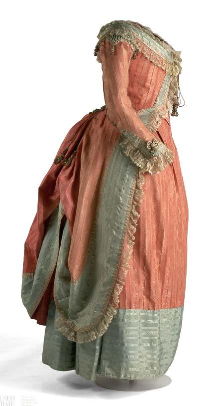 th th 16 - to 18 -CENTURY COSTUME FROM THE COLLECTIONS OF THE COSTUME MUSEUM OF MADRID with flower-shaped silk cut-outs.