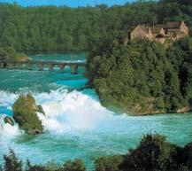 Xena tar-rhine Falls ewwa Schaffhausen. invaωjoni. In enwità mill-akbar. Minn fuq dan il-bini tista tara dehra panoramika tal-belt li tant hi sabi a li t allik ming ajr nifs.