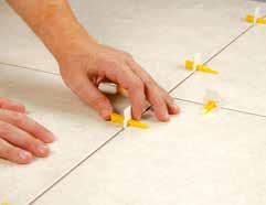 tiles, immediately after that insert the wedge in the cleft.