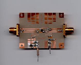 BOARD LAYOUT Figure 3 shows the layout of the PCB, which has the following properties: type: double copper-clad PTFE fiber-glass (backside ground) h = 0.