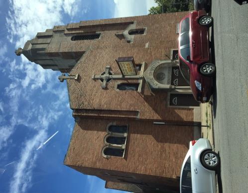 The few parishioners that are left in the New Alpha Progressive Baptist Church hold their services in the basement. The main church is in great disrepair with boarded up windows and crumbling walls.