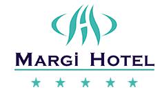 Margi Hotel Το μοντέρνο Margi Hotel προσφέρει δωμάτια σε εμπορική περιοχή στην