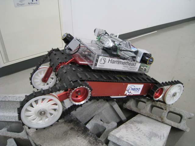 ,, Traversing Assist System for Tracked Vehicles on Rough Terrain Based on Continuous Three-Dimensional Terrain-Scanning Yoshito OKADA, Keiji NAGATANI and Kazuya YOSHIDA Department of Aerospace