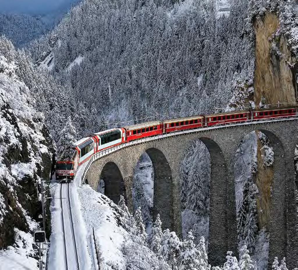 Αλπικό Τρένο Διαδρομές που περνούν πάνω από τα σύννεφα, χιονισμένες βουνοκορφές