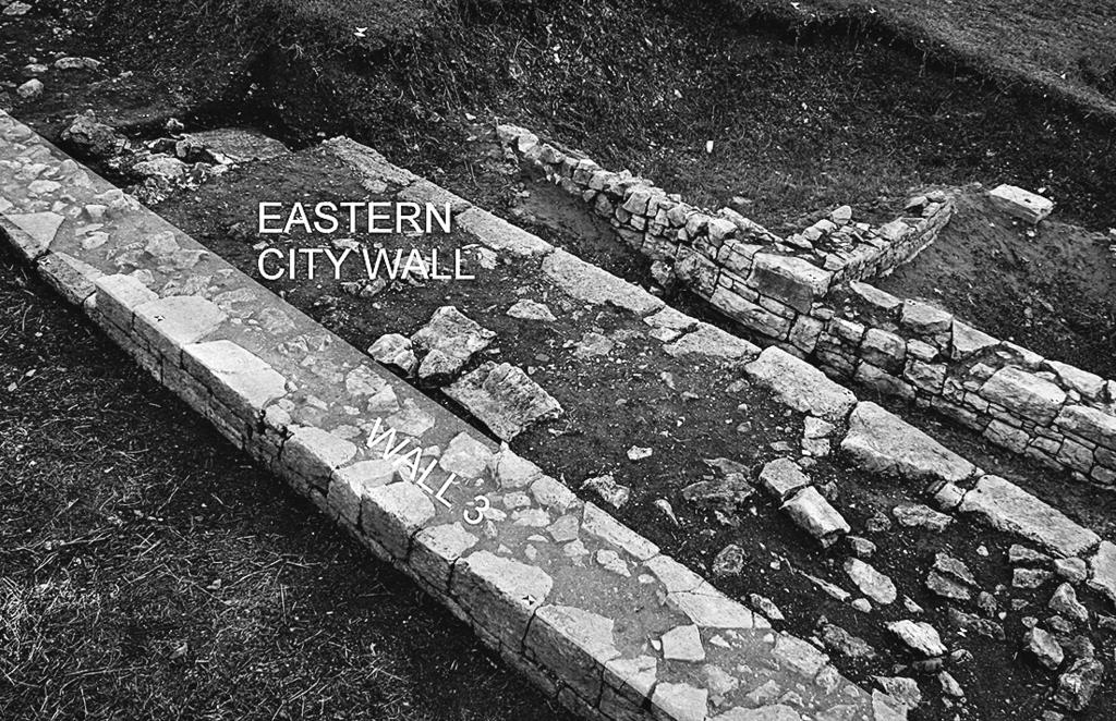 New Answers to Old Problems Figure 5. Wall 3, an outer face of the eastern city wall. Figure 6. Remains of wall 7 with thresholds placed on top.