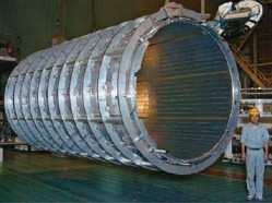 56 CHAPTER 2. LHC ACCELERATOR AND EXPERIMENTS of superconducting wire an it is cooled by liquid helium.