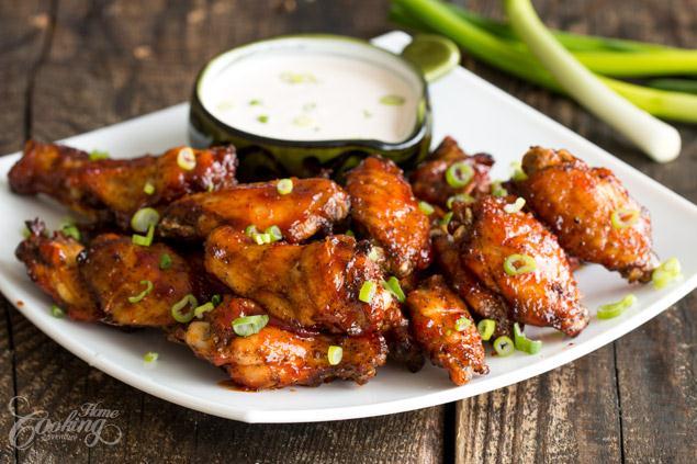 BBQ Chicken Wings Ingredients: Chicken Parchment paper One bowl of oil Garlic powder Smoked paprika Black pepper Green onion Sauces (use either or any) Hot sauce Barbeque sauce Dipping sauce